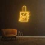 Orange Nails LED Neon Sign for a welcoming and vibrant salon environment.