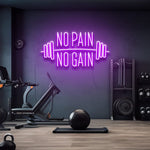 No Pain No Gain' LED neon sign in purple, the perfect motivational gym decor to encourage perseverance and hard work in any space.