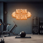 No Pain No Gain LED Neon Sign in orange light, motivational gym decor that inspires strength and determination with vibrant neon glow.