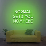 Bold green 'Normal Gets You Nowhere' LED neon sign, ideal for spaces that celebrate individuality, perfect for motivating those who want to break the norm.