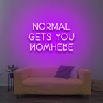 Bright pink 'Normal Gets You Nowhere' LED neon sign, adding a fun and motivating touch to your space, reminding you to embrace individuality and follow your dreams.