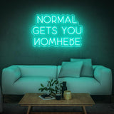 Motivational 'Normal Gets You Nowhere' LED neon sign in sea green, perfect for creating an inspiring atmosphere in your home, office, or gym.