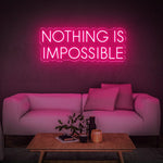 Eye-catching pink 'Nothing Is Impossible' LED neon sign, an ideal motivational décor for home or office spaces, reminding you to believe in limitless possibilities.