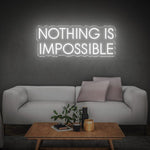 Sleek white 'Nothing Is Impossible' LED neon sign, offering a modern and motivational touch to your décor while inspiring confidence and success.