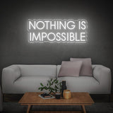 Sleek white 'Nothing Is Impossible' LED neon sign, offering a modern and motivational touch to your décor while inspiring confidence and success.