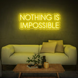 Sunny yellow 'Nothing Is Impossible' LED neon sign, adding vibrant energy and a powerful message to your space, perfect for creating a positive atmosphere.