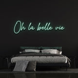 Refreshing sea green 'Oh la Belle Vie' LED neon sign, adding a calm and peaceful vibe to your home or office, while inspiring you to enjoy the beauty of life.