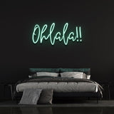 Fresh green 'Ohlala' LED neon sign, bringing a lively and vibrant energy to your space, great for adding personality to a living room or event.