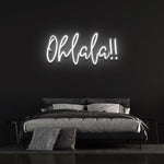 Elegant white 'Ohlala' LED neon sign, a stylish and minimalist piece that brightens up your home or event décor with its clean, chic glow.