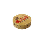 "RAW Metal Round Tin small carrying case, durable storage with grip lid for easy transport of essentials.