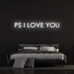 Beautiful ‘P.S. I Love You’ LED neon sign for home décor, creating a romantic ambiance with customizable colors and styles.