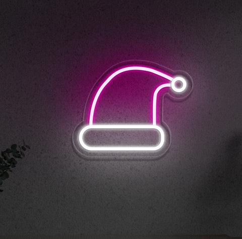 Santa Claus Hat LED Neon Sign – Festive Christmas wall decor with vibrant hot pink and white colors, energy-efficient LED neon tubing, perfect for holiday displays at home or business.






