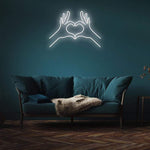 Vibrant 'Spread Love' neon sign with a glowing light, designed for home, office, or event use, bringing positivity and brightness.
