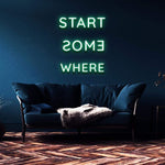 LED "Start Somewhere" neon sign with clear acrylic backing, perfect for home or office decor, energy-efficient and durable.