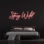 Stay Wild LED neon sign for bedroom or dorm room, perfect for creating a bold and lively atmosphere.