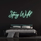 Vibrant Stay Wild LED neon sign, ideal for parties, game rooms, or creating an adventurous ambiance in any space.

