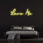 Stylish Love Me LED Neon Sign – Vibrant and charming wall decor for homes or events, creating a warm and inviting atmosphere.