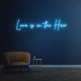 Trendy Salon Neon Sign – 'Love Is in the Hair' LED décor, ideal for creating a welcoming and fashionable space.