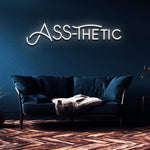 Vibrant ASS-THETIC Neon Sign – Stylish LED wall art for home or studio decor, designed to bring a cheerful and modern vibe to any space.