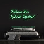 White Rabbit LED neon sign creating a mystical and magical ambiance for home or event decor.