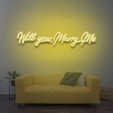 Will You Marry Me LED neon sign in yellow color, creating a warm romantic ambiance for special moments.