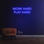 Work Hard Play Hard neon sign in blue light, perfect for inspiring office decor or modern home aesthetics.