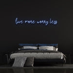 Worry Less, Live More LED neon wall sign, perfect for a positive and vibrant home or office atmosphere.