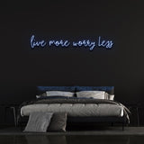 Worry Less, Live More LED neon wall sign, perfect for a positive and vibrant home or office atmosphere.