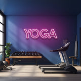 Pink yoga LED neon sign illuminating a fitness room for a vibrant and modern gym decor.